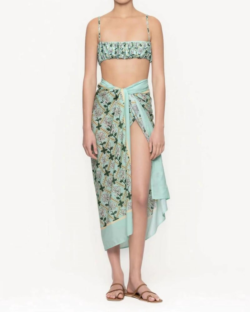 Front of a model wearing a size one-size-fits-all Lavanda Herbal Sarong Wrap In Blue in Blue by AGUA BENDITA. | dia_product_style_image_id:359797